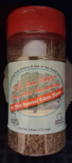 Spice container with a red lid and label on a dark background